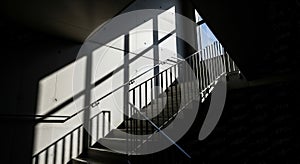 stairway to light: architectural contrast and shadow