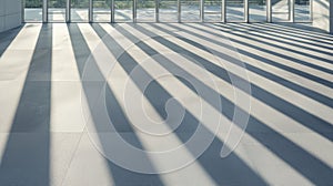 A room with a window and a concrete floor.