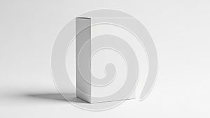 A tall, rectangular, white object casting a shadow on a plain background