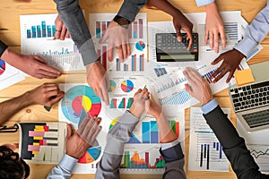 Business Meeting with Charts and Graphs