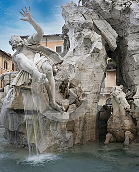 detail of the fountain of the four rivers, rio del plata allegorical statue, piazza navona, rome