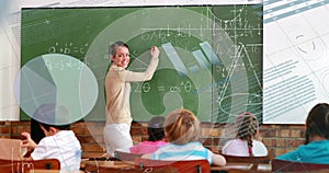 Image of digital interface with data, graphs and equations moving over female maths teacher writing 