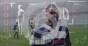 Image of digital interface with medical data processing over rugby players