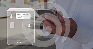 Image of digital interface with online communicator over man using smartphone photo