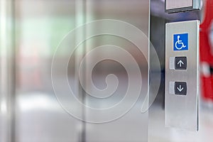 Image of disabled lift button. Stainless steel elevator panel push buttons for blind and disability people. Push Button For the di