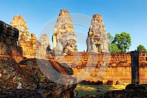 An image displaying the towers of the famous Eastern Mebon, an ancient medieval Khmer building in Cambodia