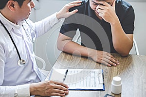 Image of doctor holding patient`s hand to encourage, talking with patient cheering and support