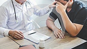 Image of doctor holding patient`s hand to encourage, talking with patient cheering and support