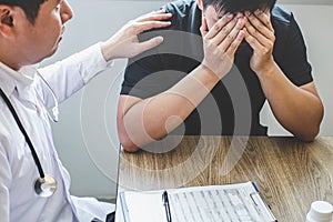 Image of doctor holding patient`s hand to encourage, talking with patient cheering and support