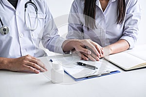 Image of doctor holding patient`s hand to encourage, talking with patient cheering and support, healthcare and medical assistant