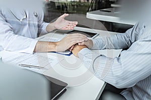 Image of doctor holding patient`s hand to encourage, talking with patient cheering and support, healthcare and medical assistant