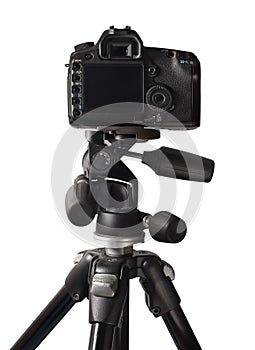 Image of DSLR camera on tripod isolated over white background
