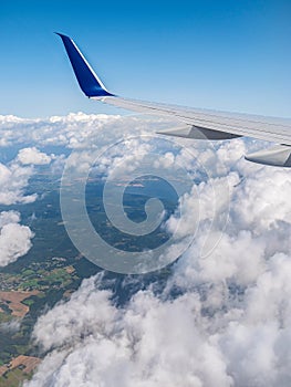 earth and plane wing view from an illuminator