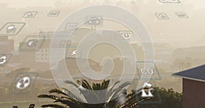 Image of eco icons and data processing over cityscape