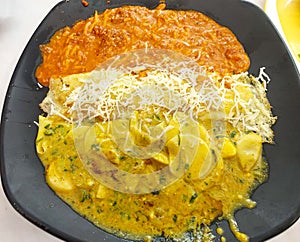 Image of egg maharaja with three different curry