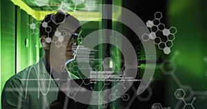 Image of elements, charts and data processing over asian male technician working in server room