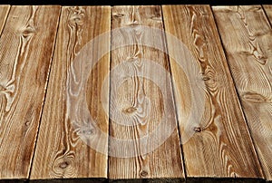 Image of empty bumpy wooden table top