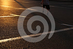 Image of empty parking lot during sunset. asphalt background.