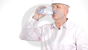 Image with an Engineer Drinking Cold Water from a Bottle