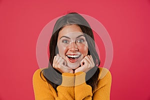 Image of excited beautiful girl expressing surprise on camera