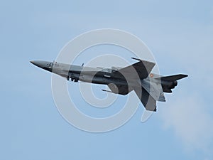 image of an F-18 of the spanish air force flying upside down