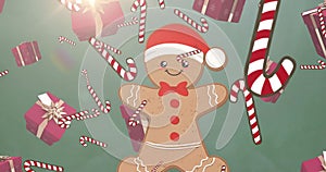 Image of falling candycane and gifts over christmas cookie