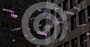 Image of falling numbers over cityscape