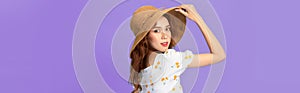 Image of fashionable asian woman 20s smiling and touching straw hat on head isolated over blue background