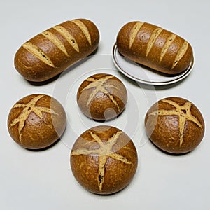 Assorted bread rolls isolated on white background