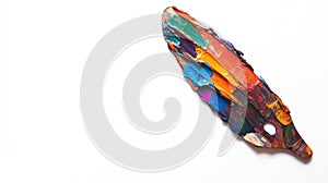 A vibrant and textured palette knife showcases an array of colors. This artistic tool captures the essence of creativity photo