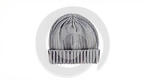 the image features a knitted winter cap presented against a stark white background