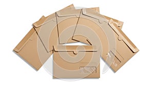 Stack of brown paper envelopes isolated on white background
