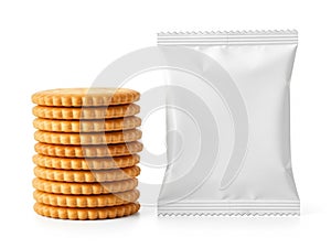 Stack of crackers and snack bag isolated on white background