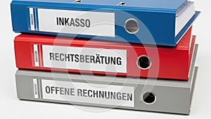 Stack of binders with labels isolated on white background