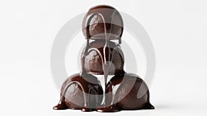 Stack of chocolate truffles isolated on white background