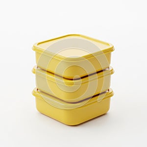 Stack of yellow containers isolated on white background