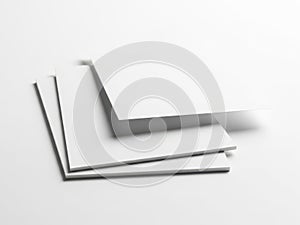 Stack of white paper sheets with subtle shadow effect isolated on white background
