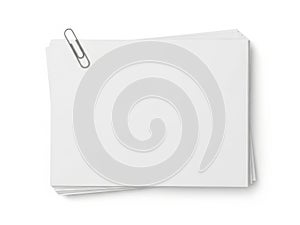Stack of white papers with paperclip, isolated on white background