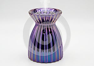 Purple ceramic diffuser isolated on white background