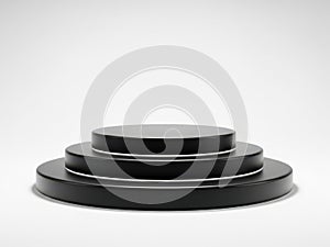 Three black circular objects stacked, isolated on white background