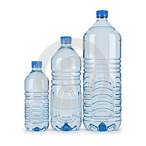 Three plastic water bottles isolated on white background