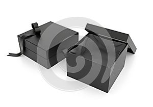 Two black gift boxes, one open isolated on white background