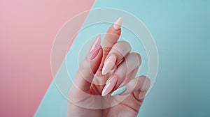 image of female hands beautifully painted in pastel hues