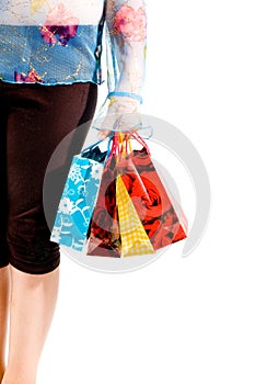 Image of female holding shoppingbags in her hand photo