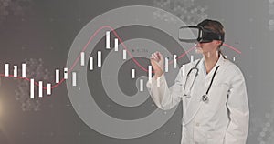 Image of financial data and graphs over caucasian female doctor in vr headset