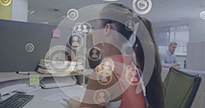 Image of financial data processing over biracial businesswoman using computer