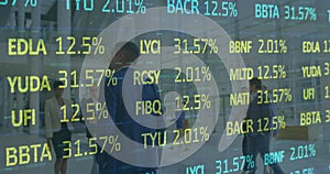 Image of financial data processing over business people working in office