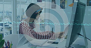 Image of financial data processing over businesswoman using computer