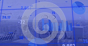 Image of financial data processing over cityscape