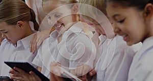 Image of financial data processing over diverse group of diverse pupils